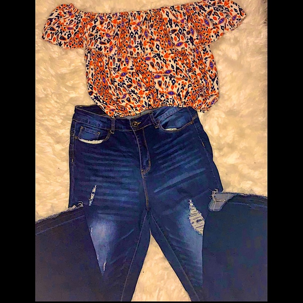 black, blue, orange, and white abstract design top
